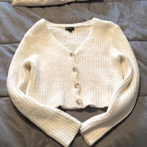 White button up sweater, very soft and warm.